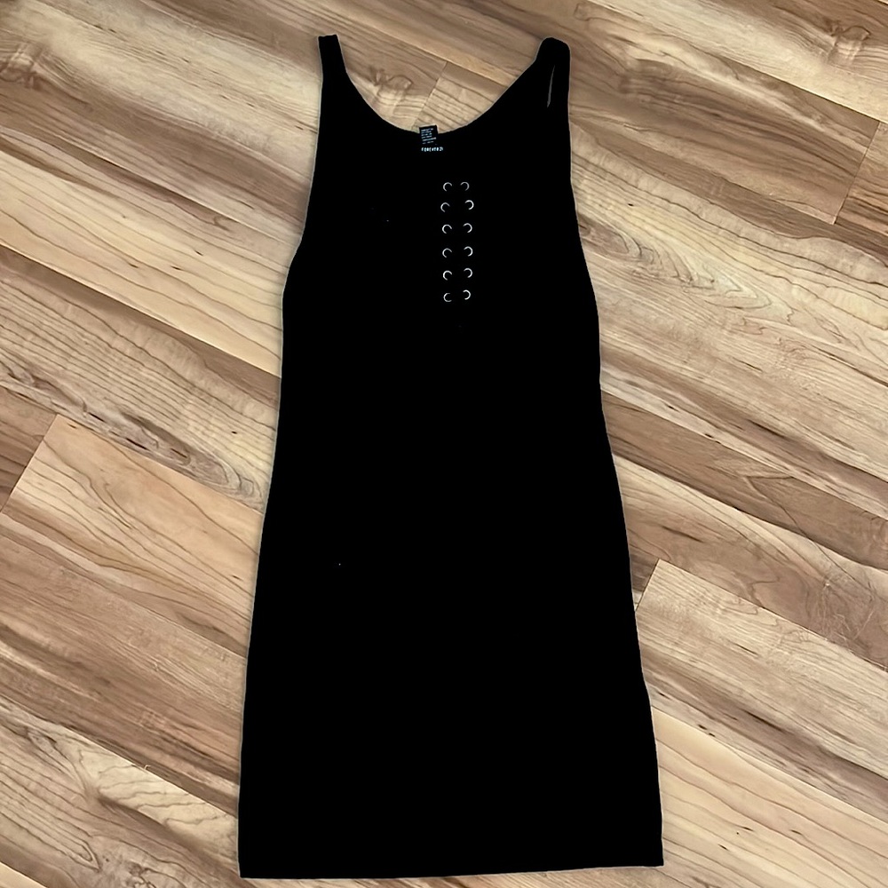 Black form-fitted cross front tank dress! Super cute casual or for a night out!